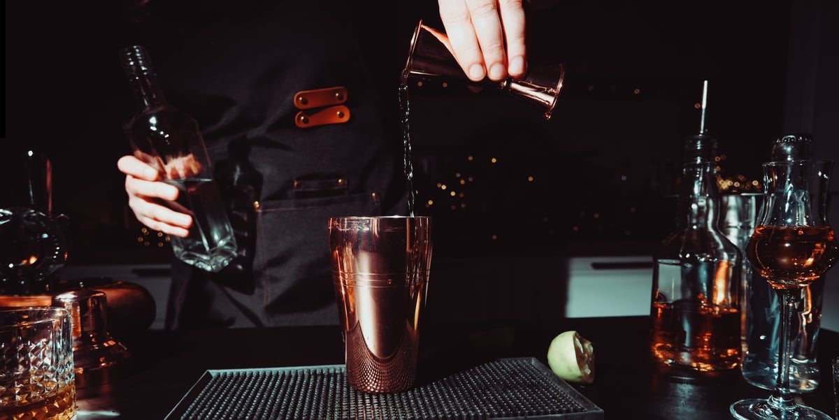 The Sip Sip bar team pouring a crafted cocktail
